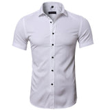 DEANWANGKT 2025 Popular trade business men's short-sleeved shirt  men's shirt non-ironing bamboo fiber solid color white inch shirt wholesale