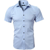 DEANWANGKT 2025 Popular trade business men's short-sleeved shirt  men's shirt non-ironing bamboo fiber solid color white inch shirt wholesale