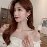 2025 fashion geometric water drop zircon leaf earrings women's s925 silver needle niche high-end banquet dress earrings