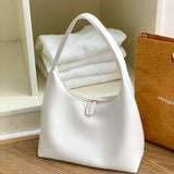 DEANWANGKT 2025 Milk tea color bag gentle wind Korean ins simple and versatile portable soft leather dumpling bag retro shoulder armpit bag