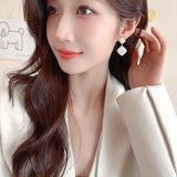 2025 Bright super flash geometric rhombus square earrings women's commuting zircon inlaid niche temperament high-end earrings wholesale