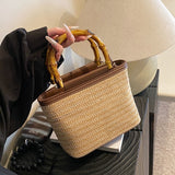 DEANWANGKT 2025 Straw bag woven portable bucket bag women's  new summer versatile messenger bag seaside vacation beach straw bag