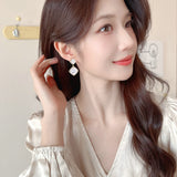 2025 Bright super flash geometric rhombus square earrings women's commuting zircon inlaid niche temperament high-end earrings wholesale