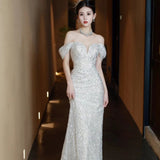 2025 One-word shoulder evening dress female banquet host temperament socialite bride toast dress light luxury fishtail dress