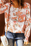 Deanwangkt - Orange floral print puff sleeve shirt with smocked cuffs